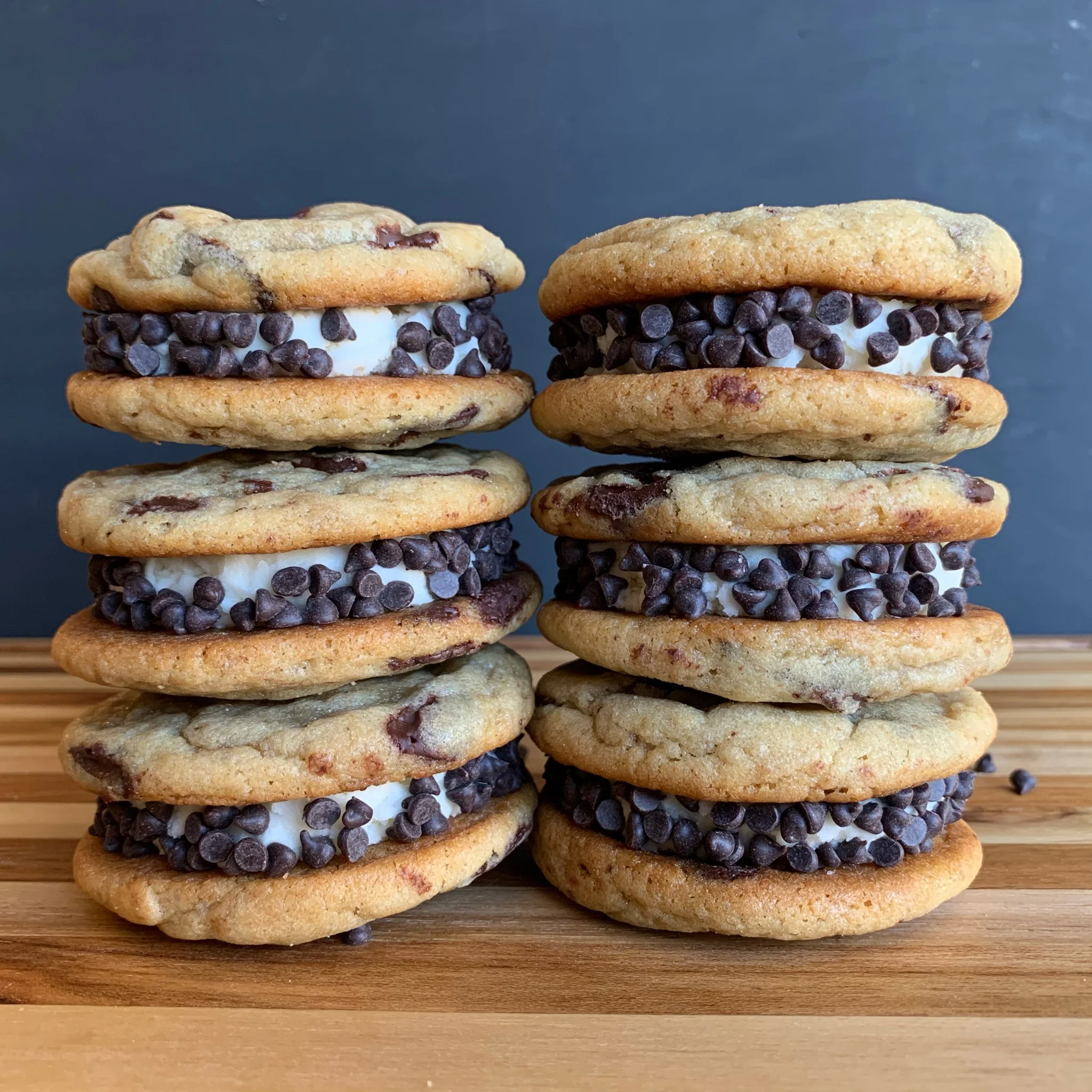 Chocolate chip cookie ice cream sandwiches stacked