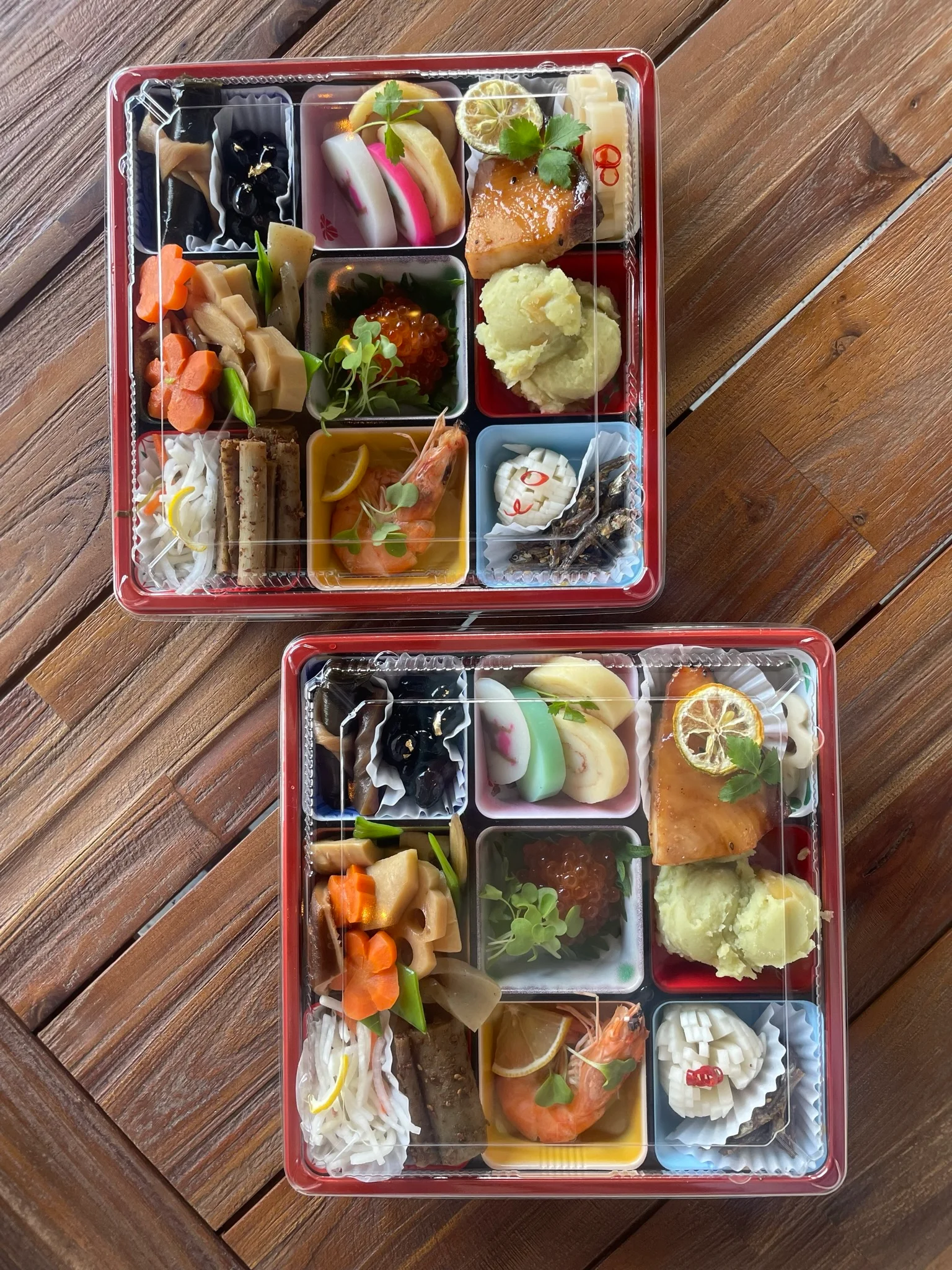 Japanese bento box featuring assorted delicacies
