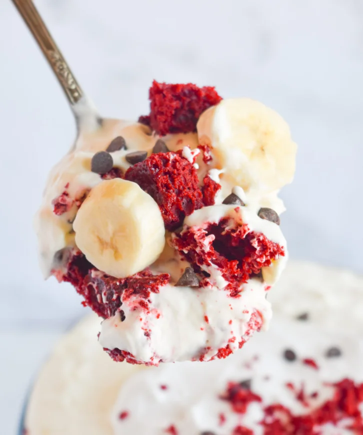 Red velvet cake trifle with bananas and whipped cream