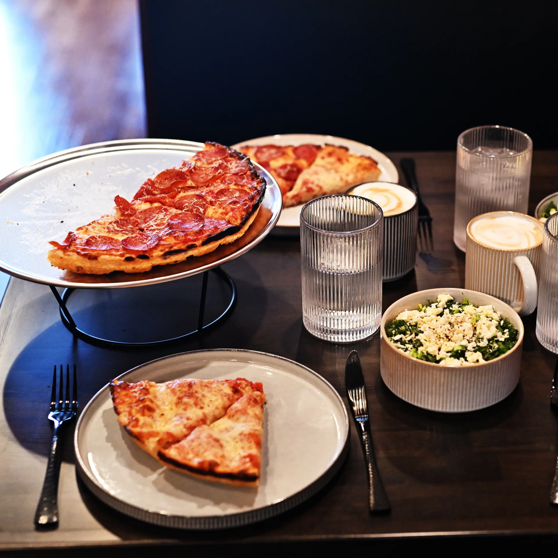 Pepperoni pizza served in a modern restaurant setting