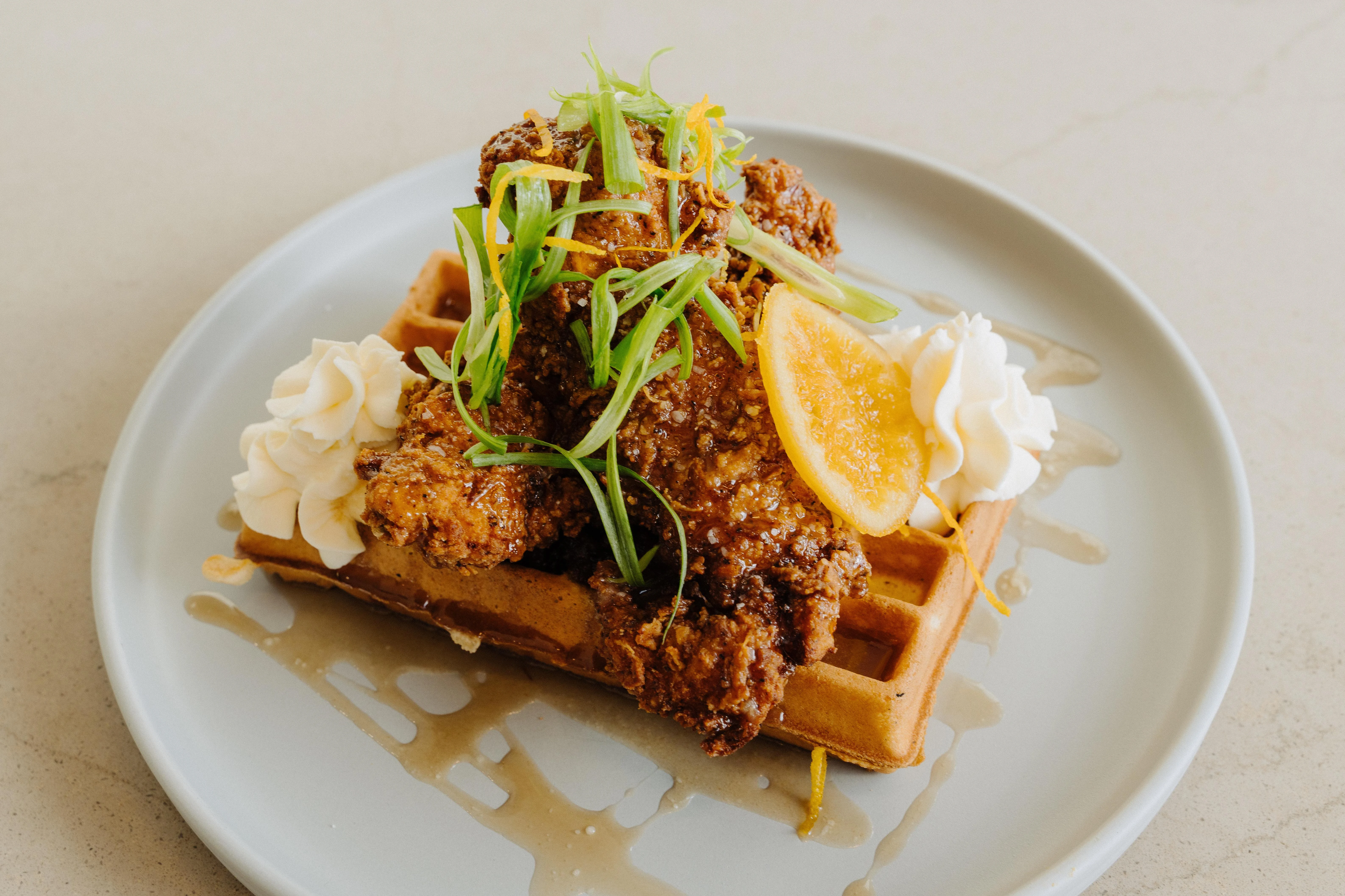 Southern fried chicken and waffles with syrup