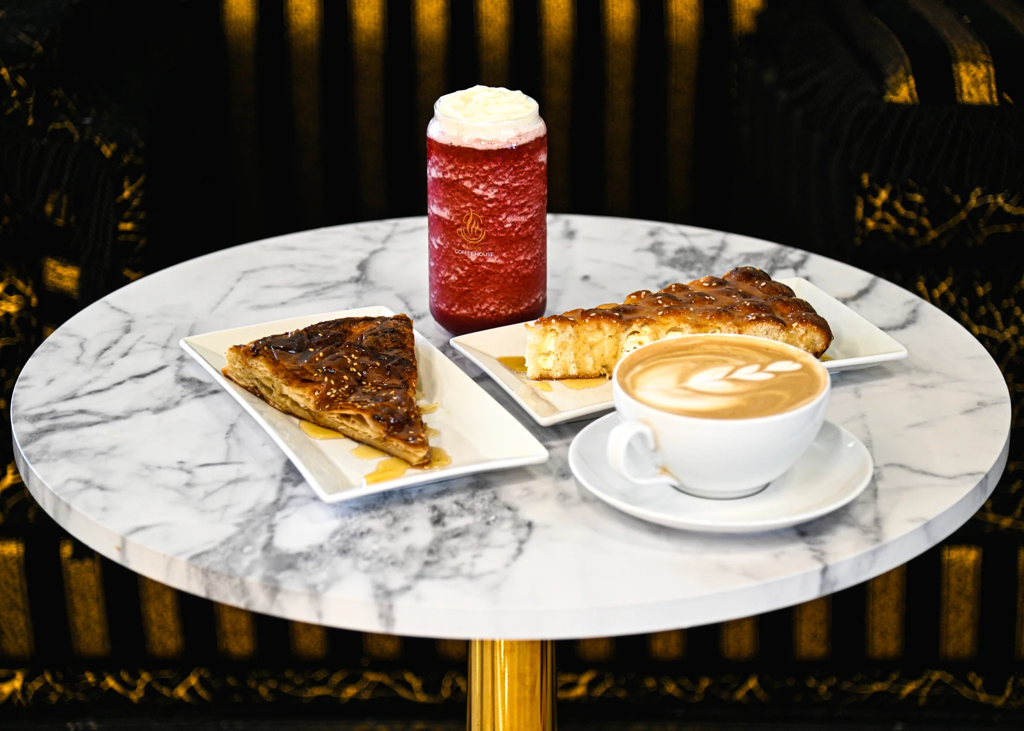 Turkish baklava and coffee on a marble table