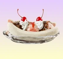 Classic American banana split dessert with ice cream and cherries