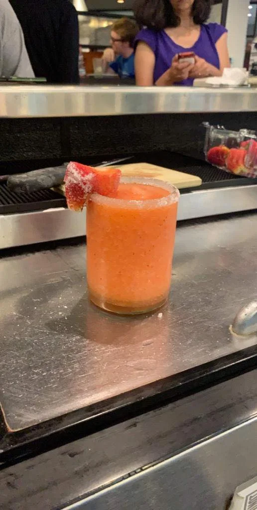 Refreshing strawberry cocktail with a sugared rim