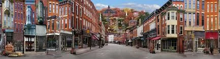 Charming street view with historic brick buildings and autumn foliage