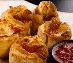 Pepperoni rolls served with marinara sauce