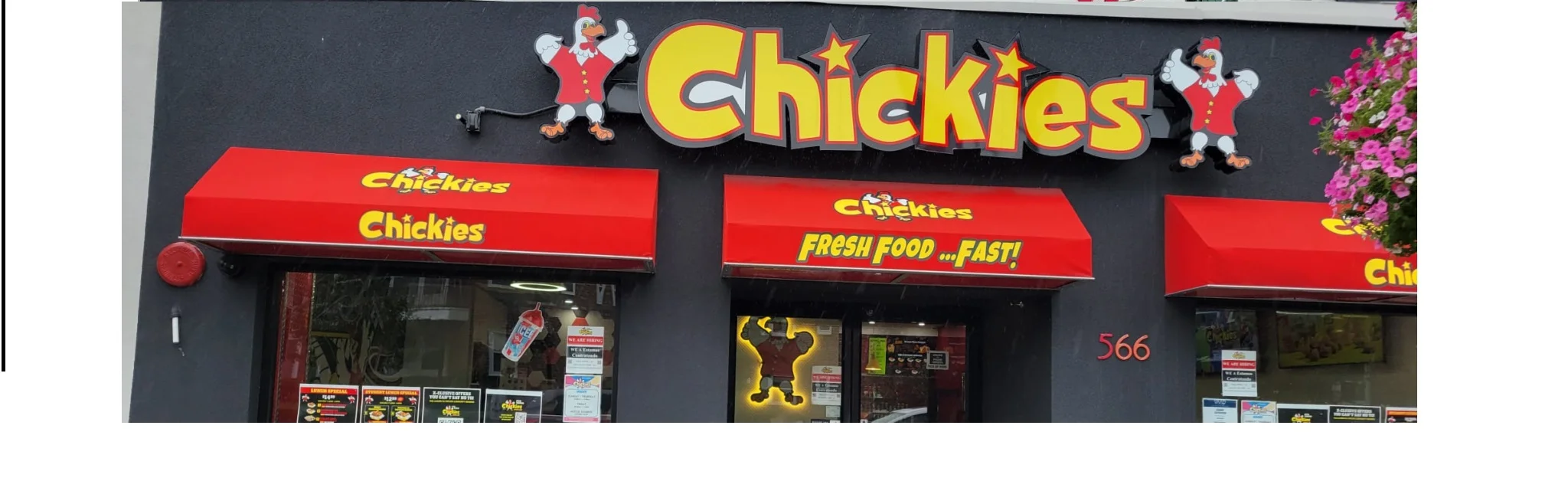 Exterior of Chickies restaurant with bright signage and awnings