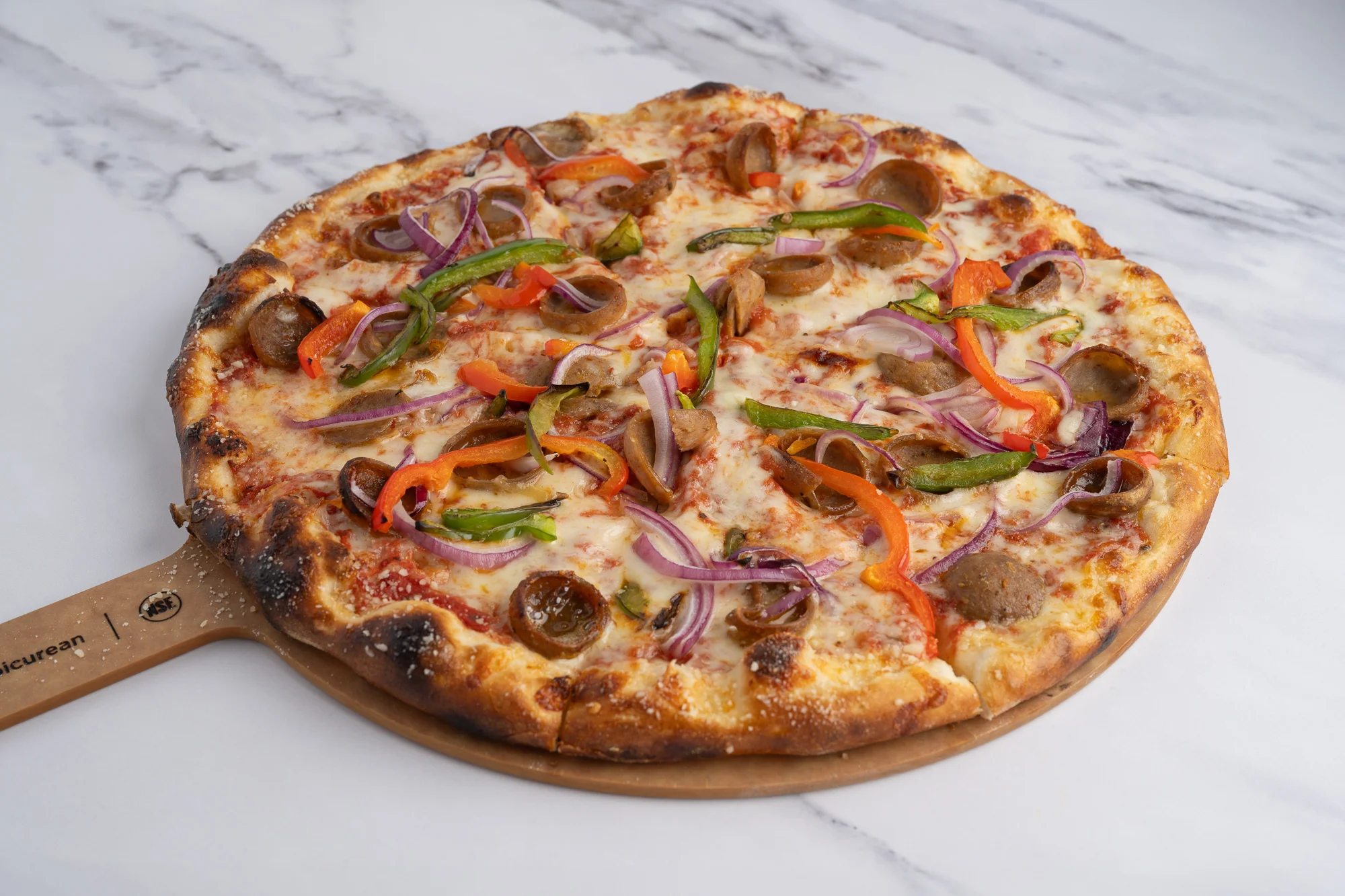 Delicious Italian sausage pizza with colorful peppers