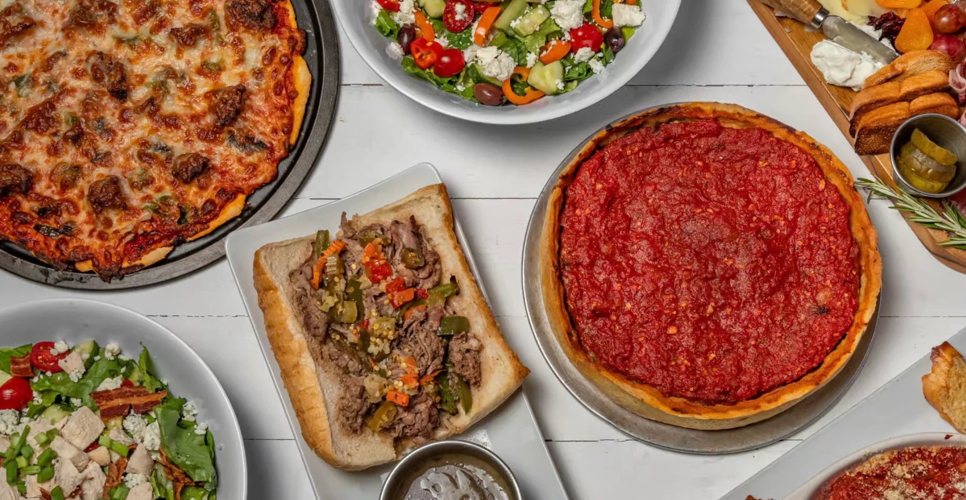 Chicago deep-dish pizza with Italian beef sandwich and fresh salad