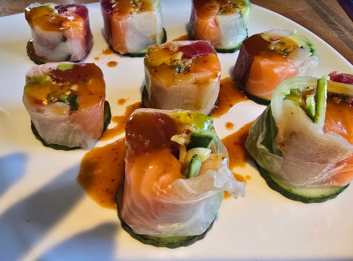 Colorful Vietnamese fresh spring rolls with dipping sauce