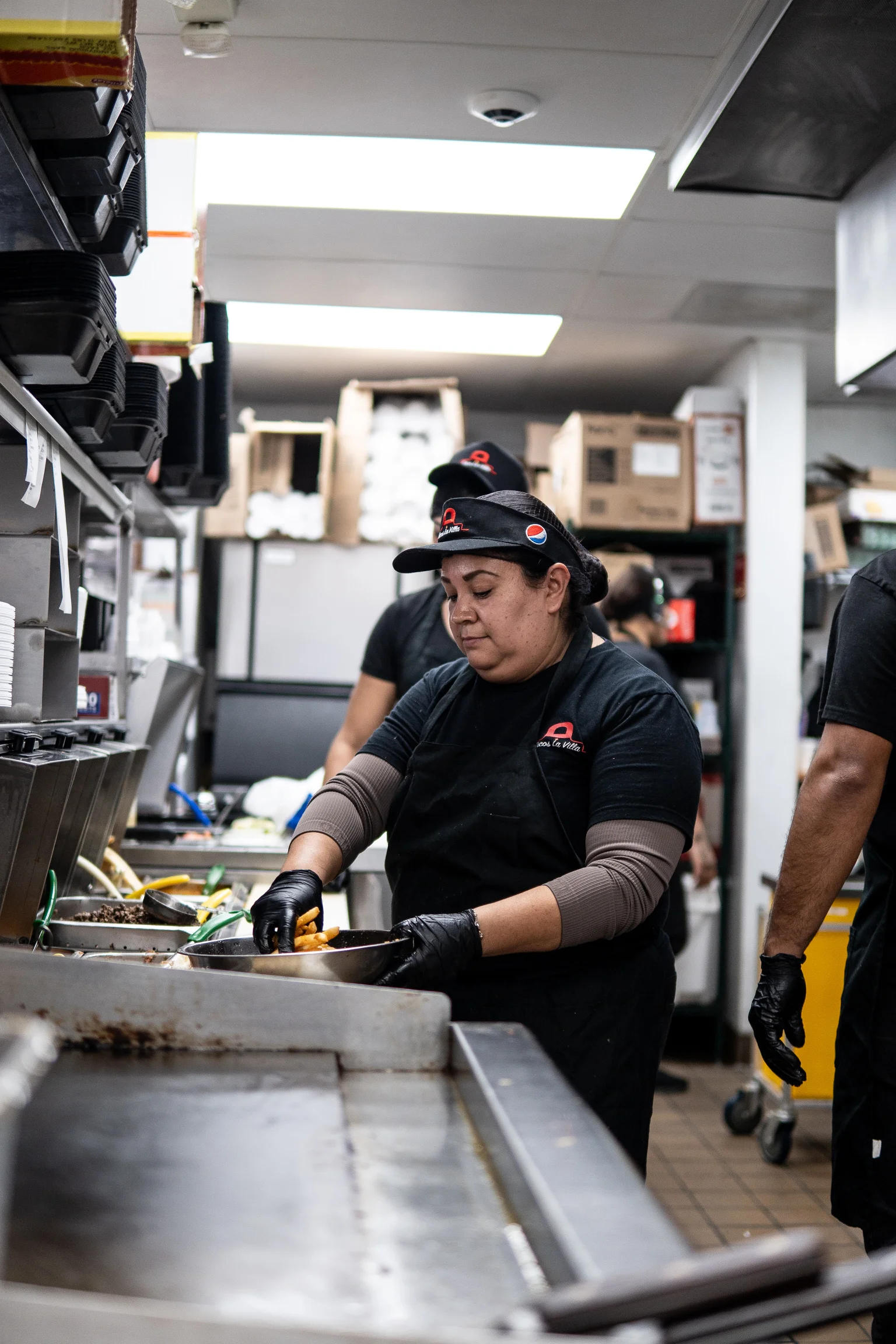 A restaurant chef preparing a dish