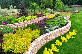Beautifully landscaped garden with colorful flowers and stone borders