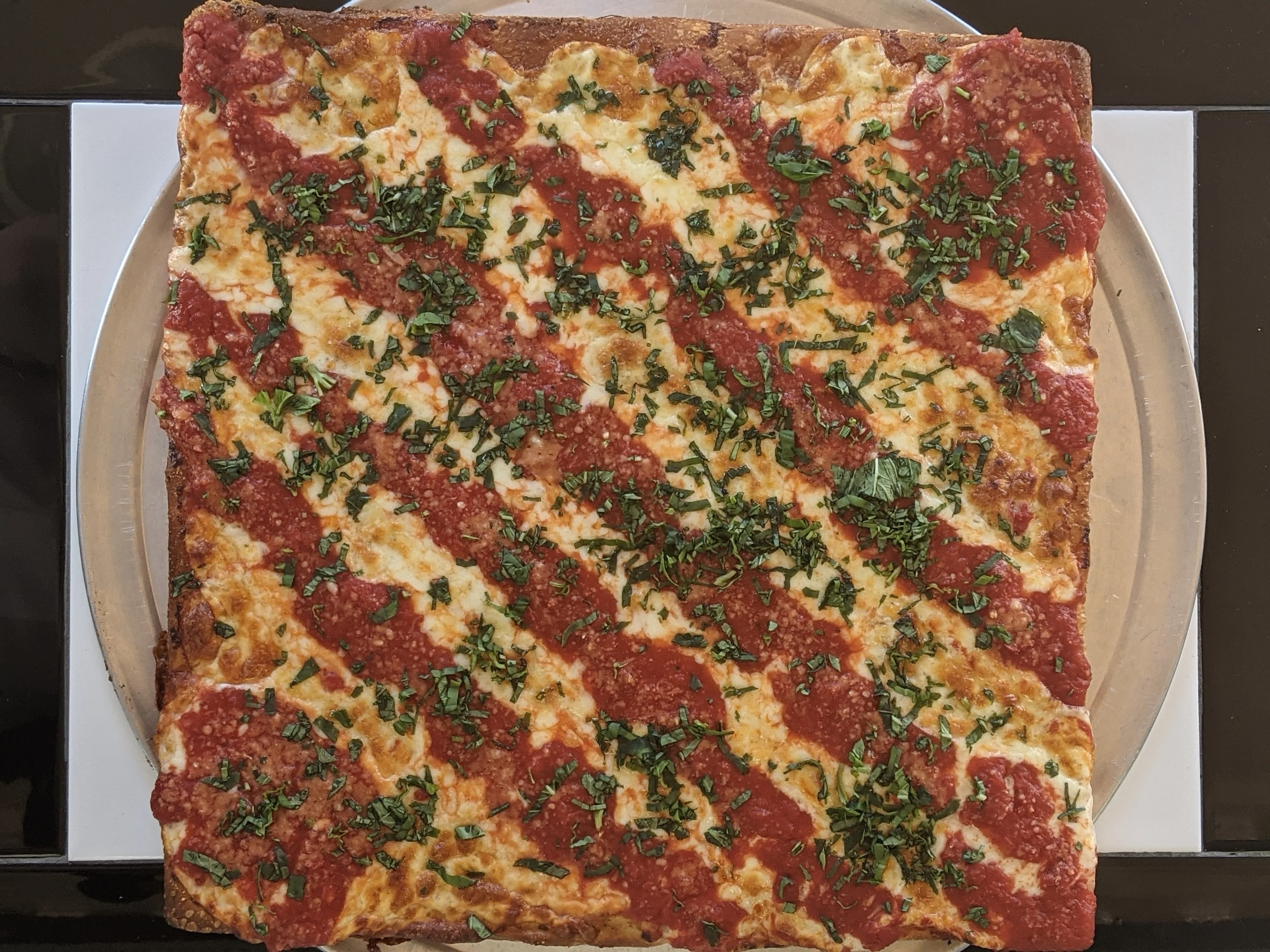 The Lucino's pizza team working as family