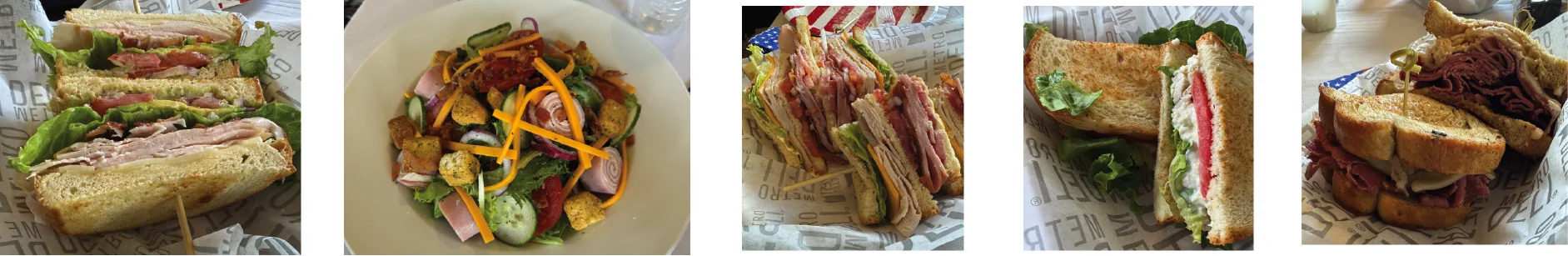 Assorted deli sandwiches and fresh salad in a casual dining setting