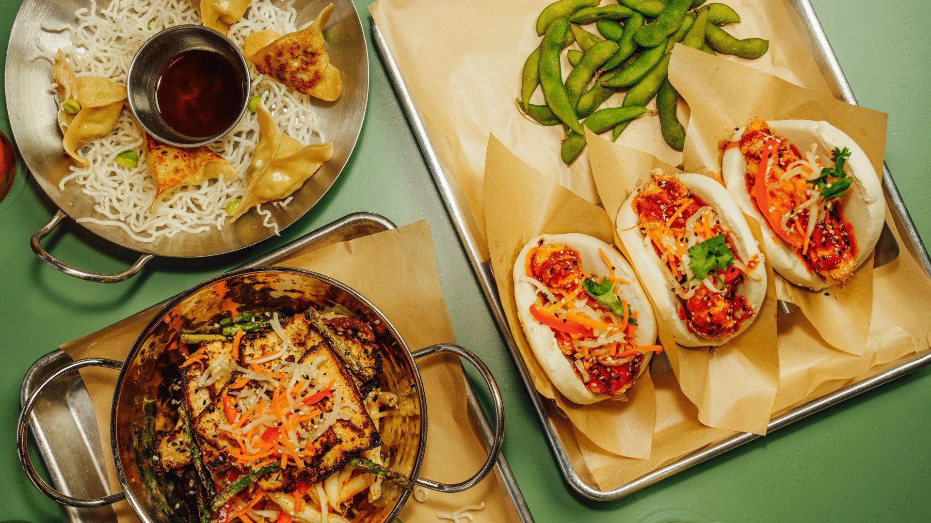 Korean bao buns with spicy chicken and pickled vegetables
