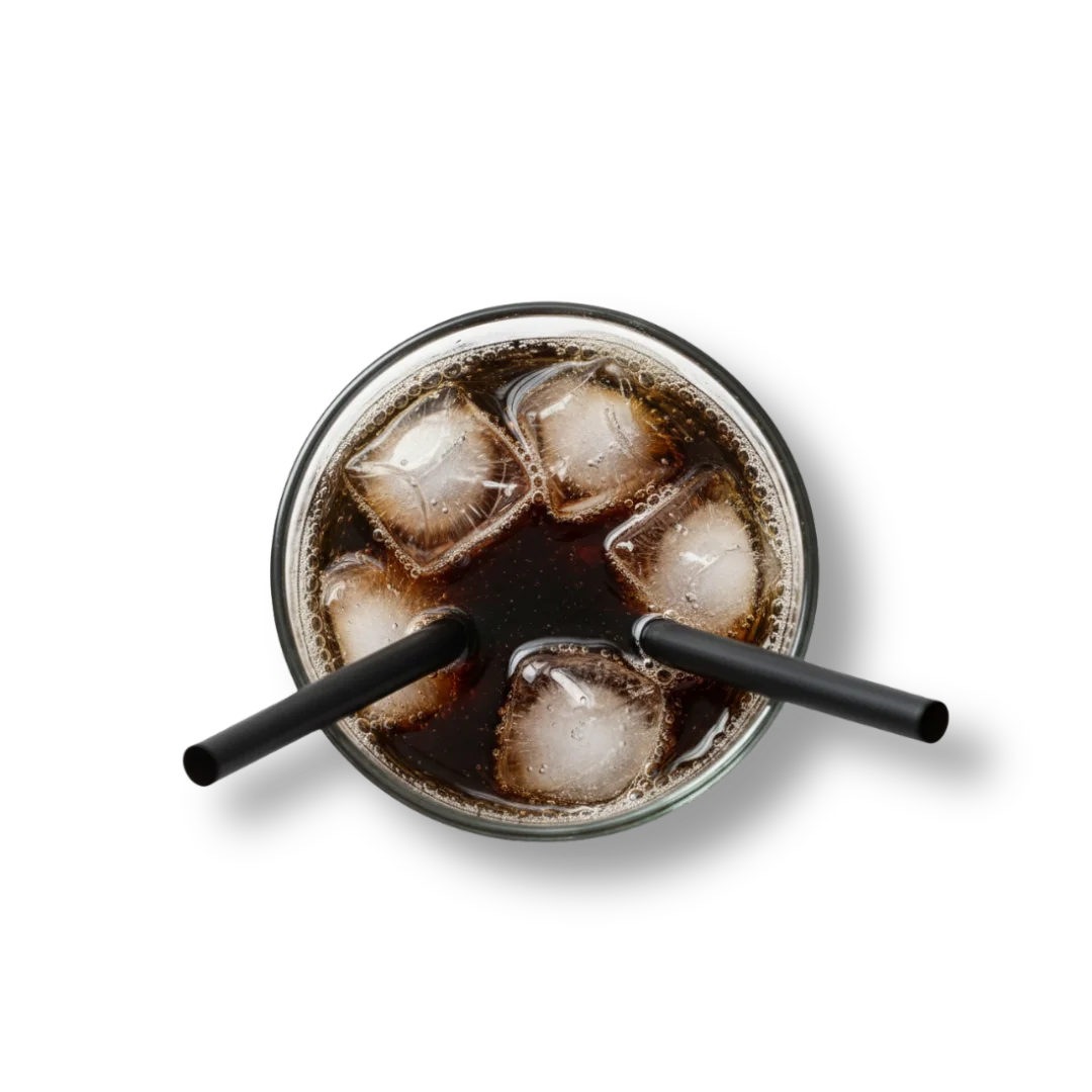 Refreshing glass of cola with ice and two straws on a black background
