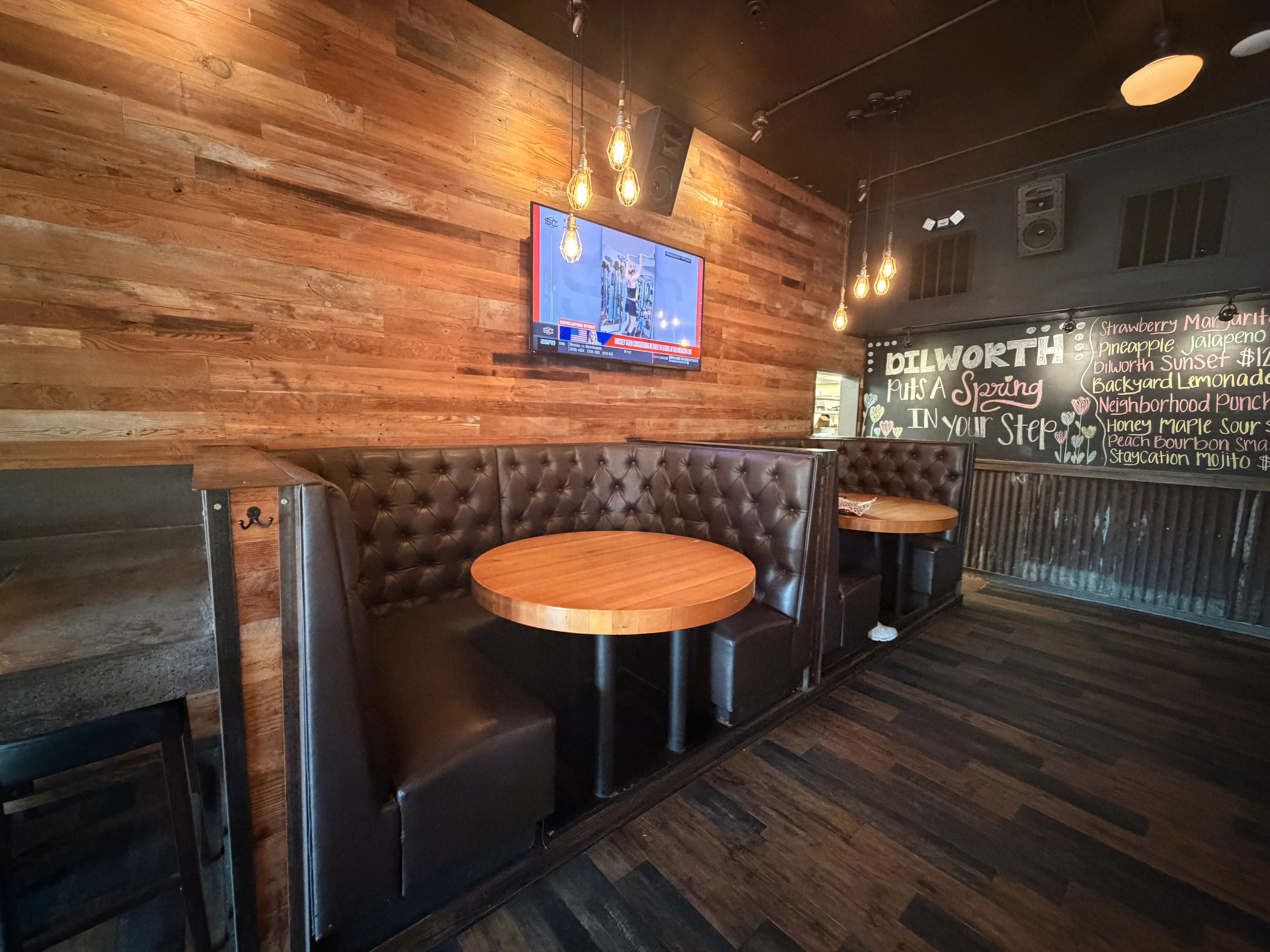 Delicious gourmet burger with fresh toppings on a wooden table