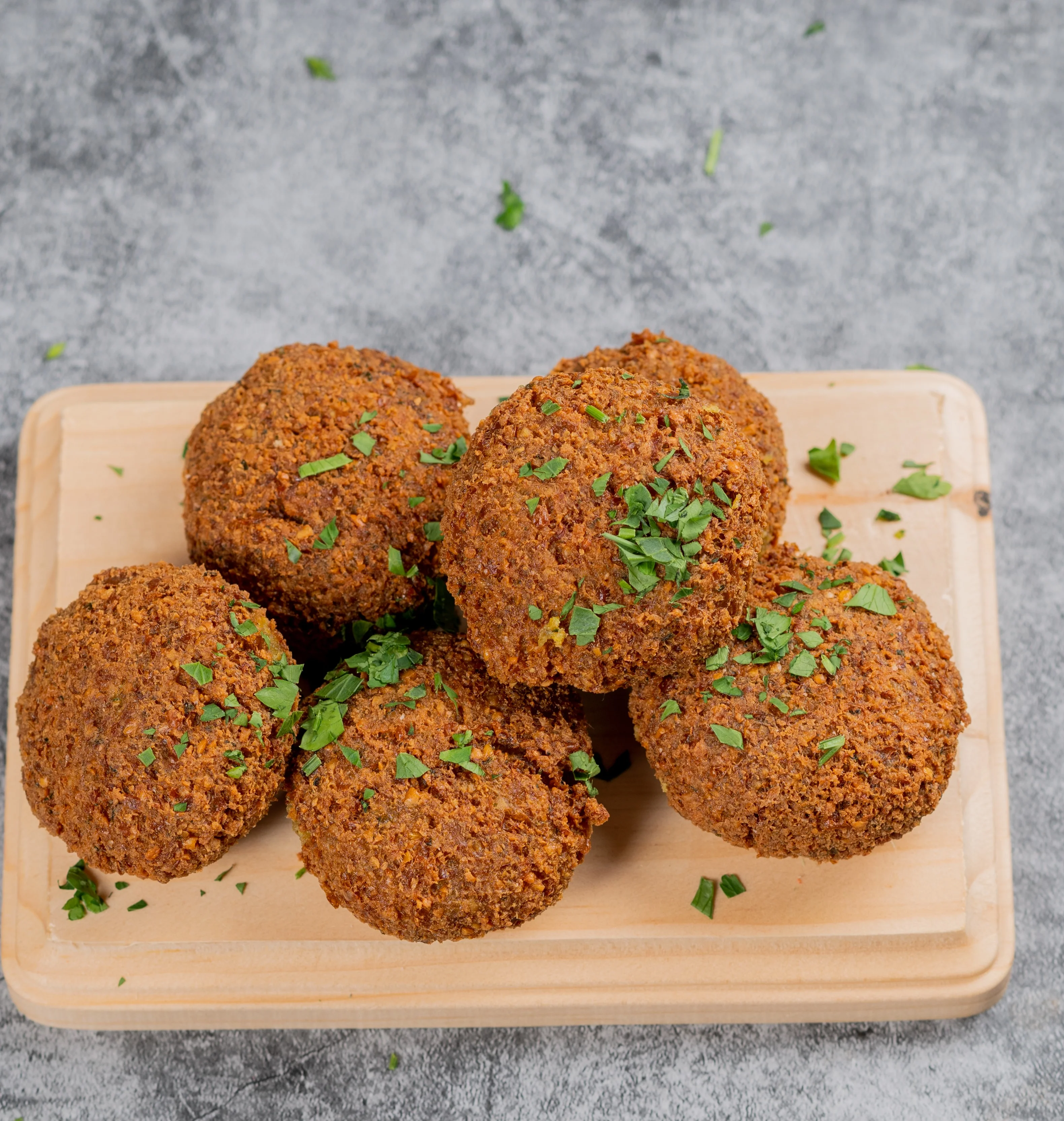Crispy falafel balls garnished with parsley