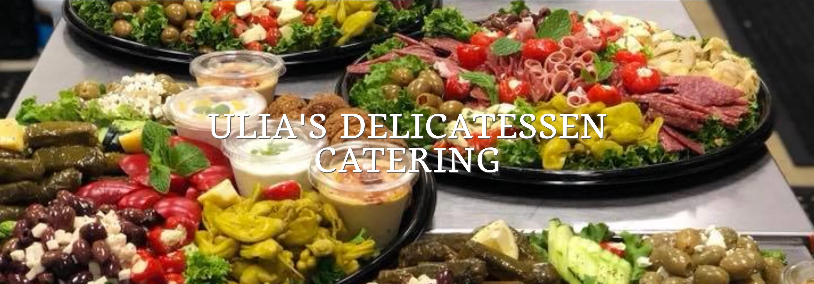 Mediterranean catering platter with assorted meats and vegetables