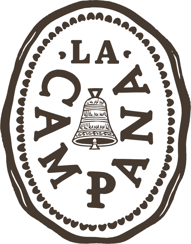A logo that features a bell with the words 'La Campana' encircling it. The design is in a circular form with a brown color scheme.