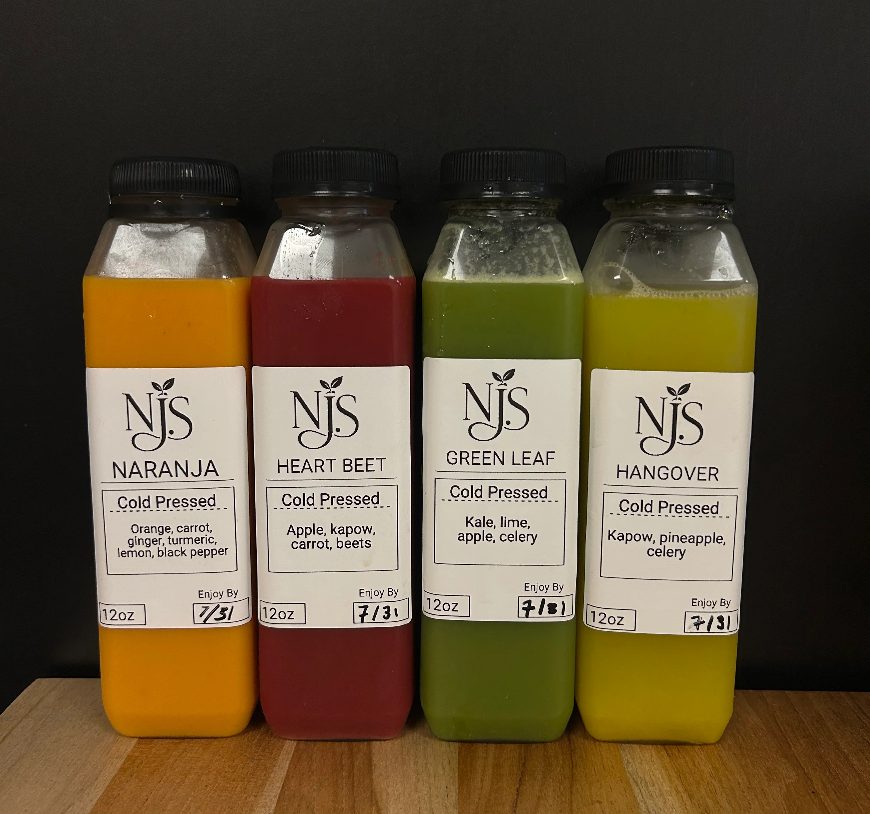 A menu featuring various smoothies, protein shakes, and juices with detailed ingredients listed for each option.
