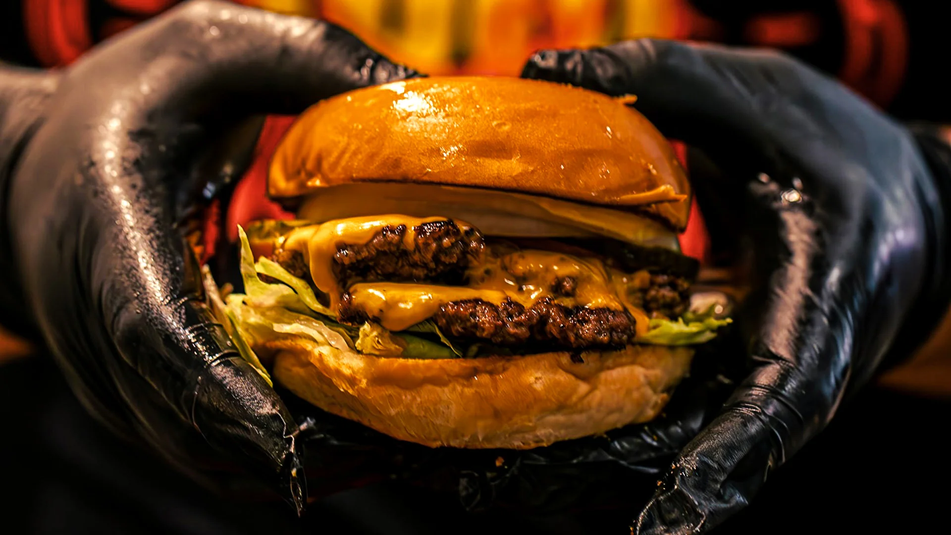 Juicy cheeseburger with lettuce in a gourmet setting