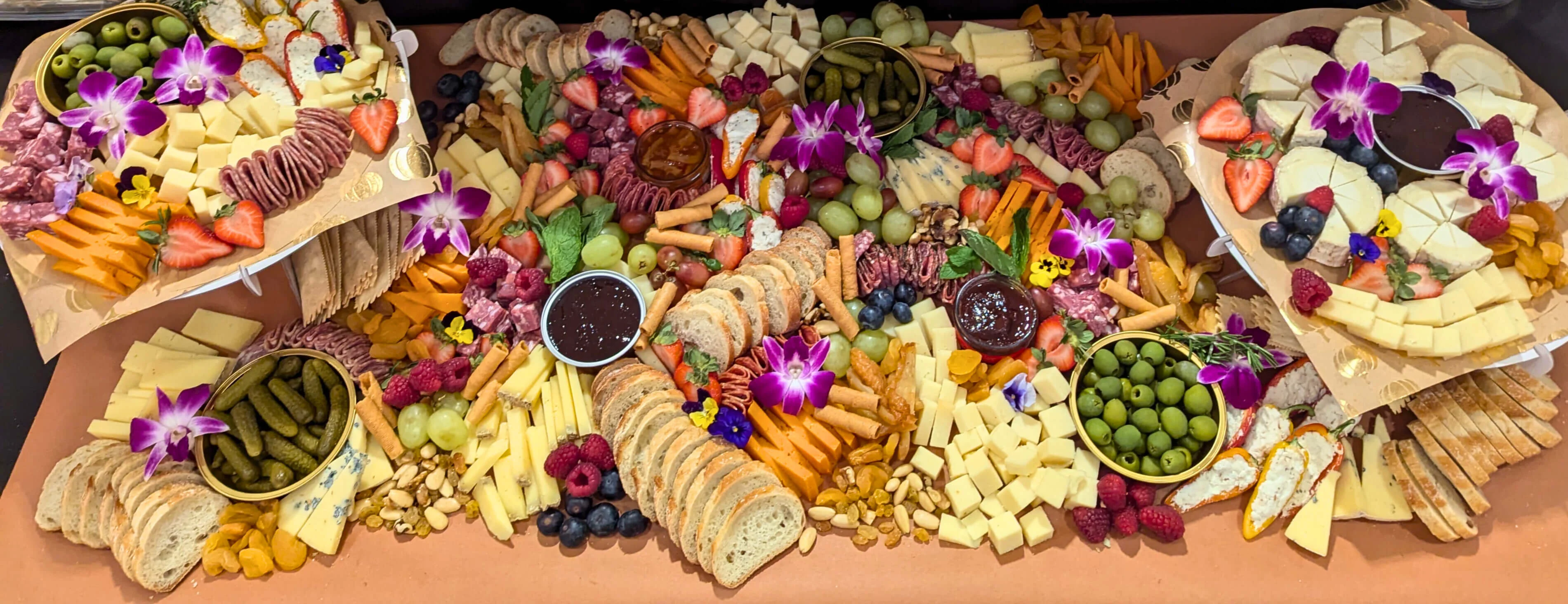 Artisan charcuterie board with assorted cheeses and fruits