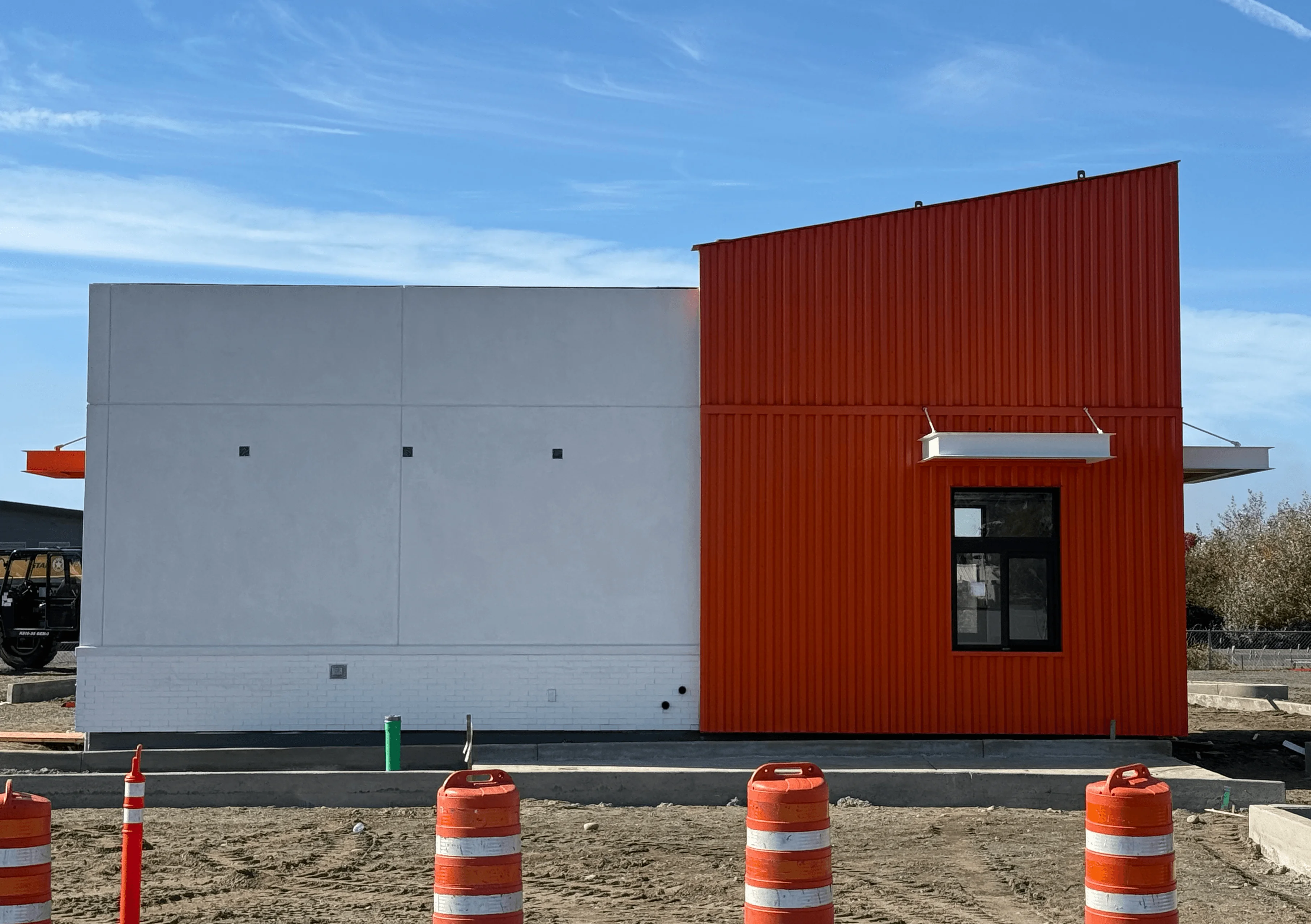 Exterior of Moe's Coffee shop with vibrant signage and outdoor seating