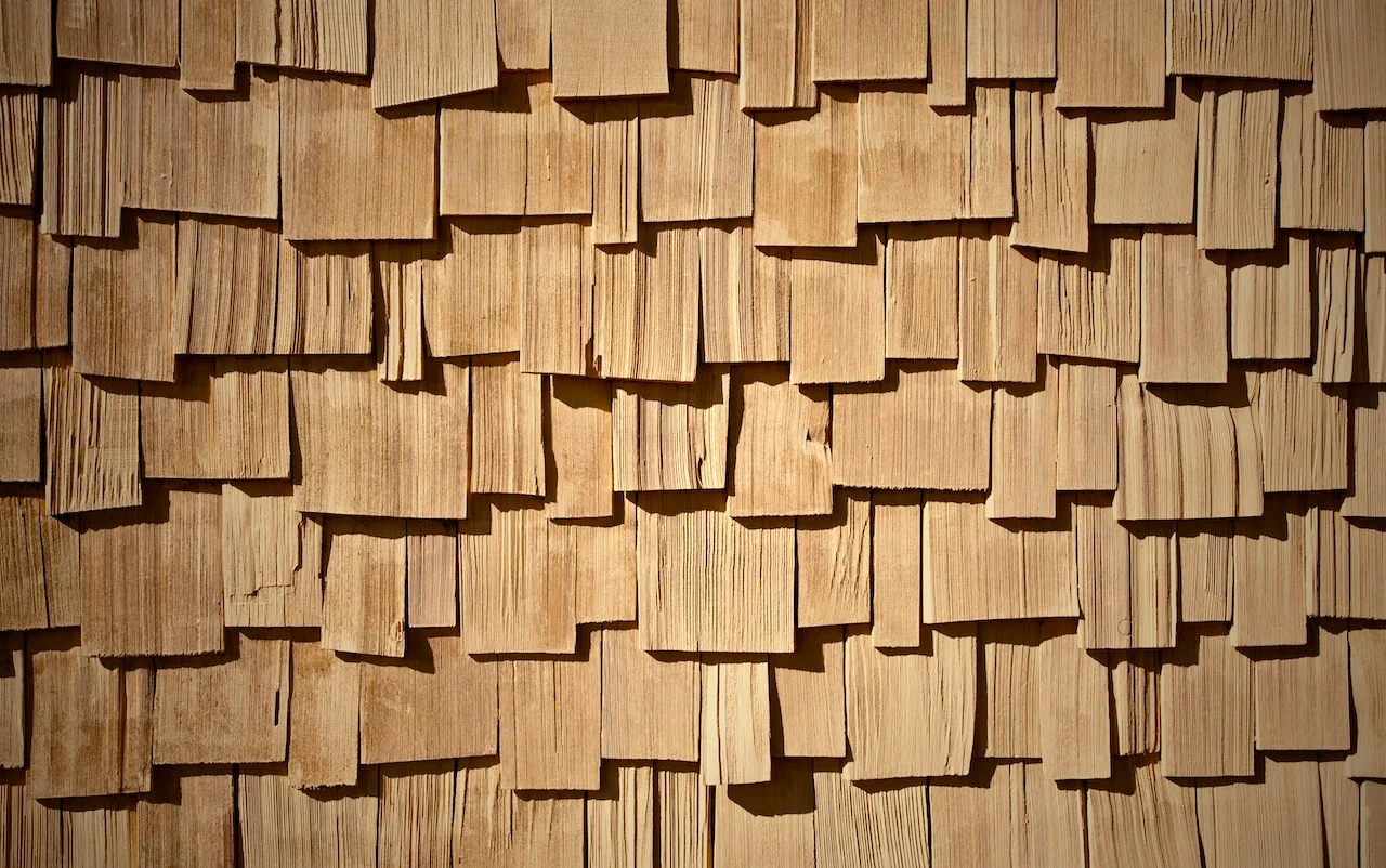 Wooden shingle wall texture in natural tones