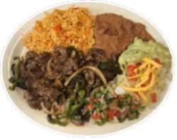 A plate of beef fajitas with rice, beans, guacamole, and salad.