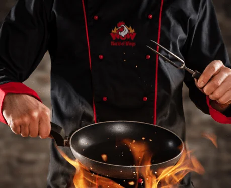 A restaurant chef preparing a dish