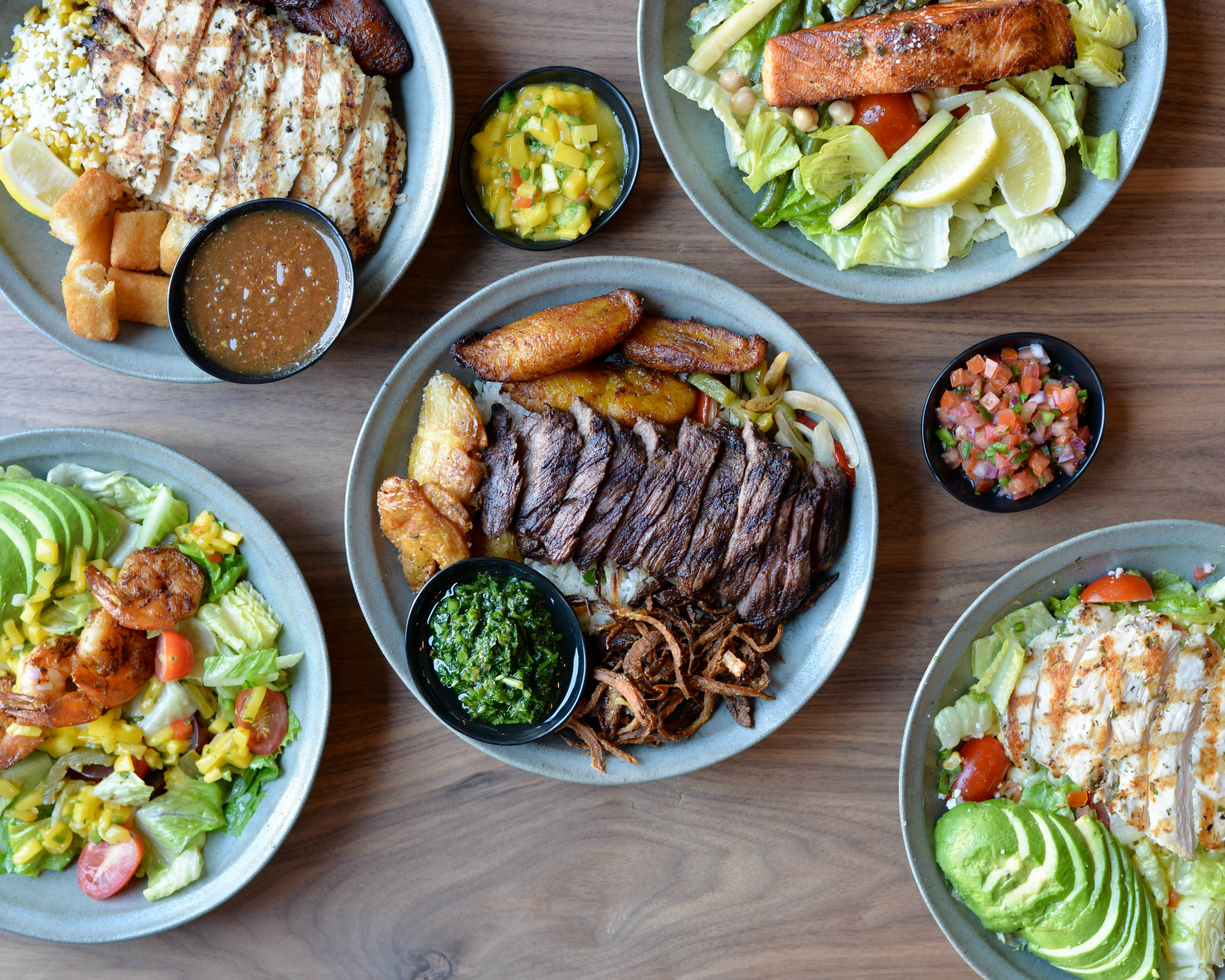 Delicious Latin American mixed grill platter with meats and sides