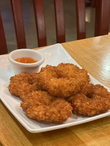 Crispy Thai coconut shrimp with sweet chili sauce