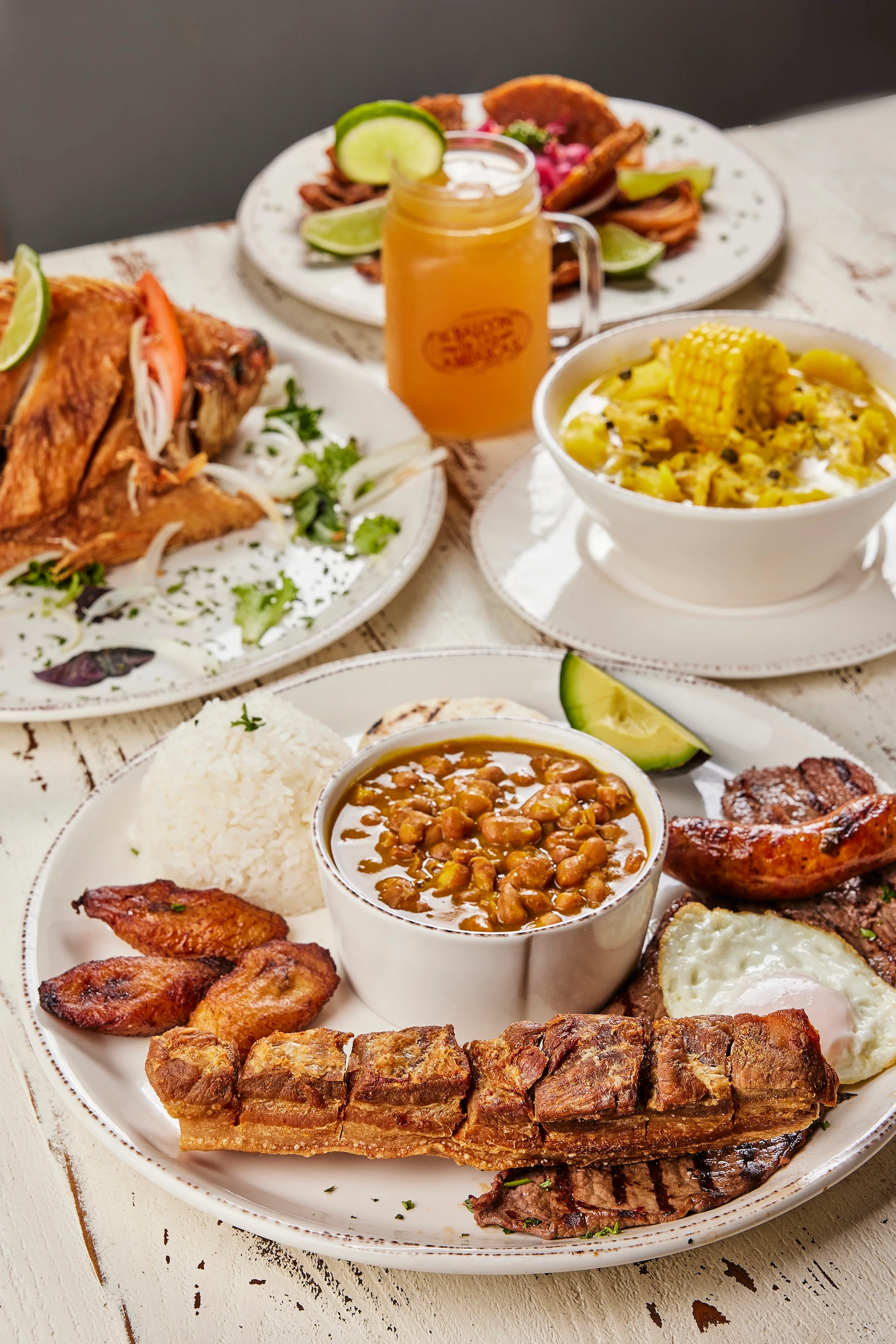 Traditional Latin American platter with grilled meats and sides