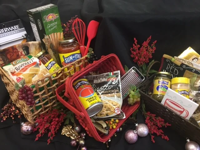 A beautifully arranged gift basket filled with gourmet treats.