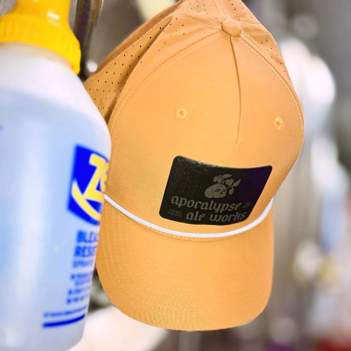 Stylish cap from Apocalypse Ale Works hanging in a brewery