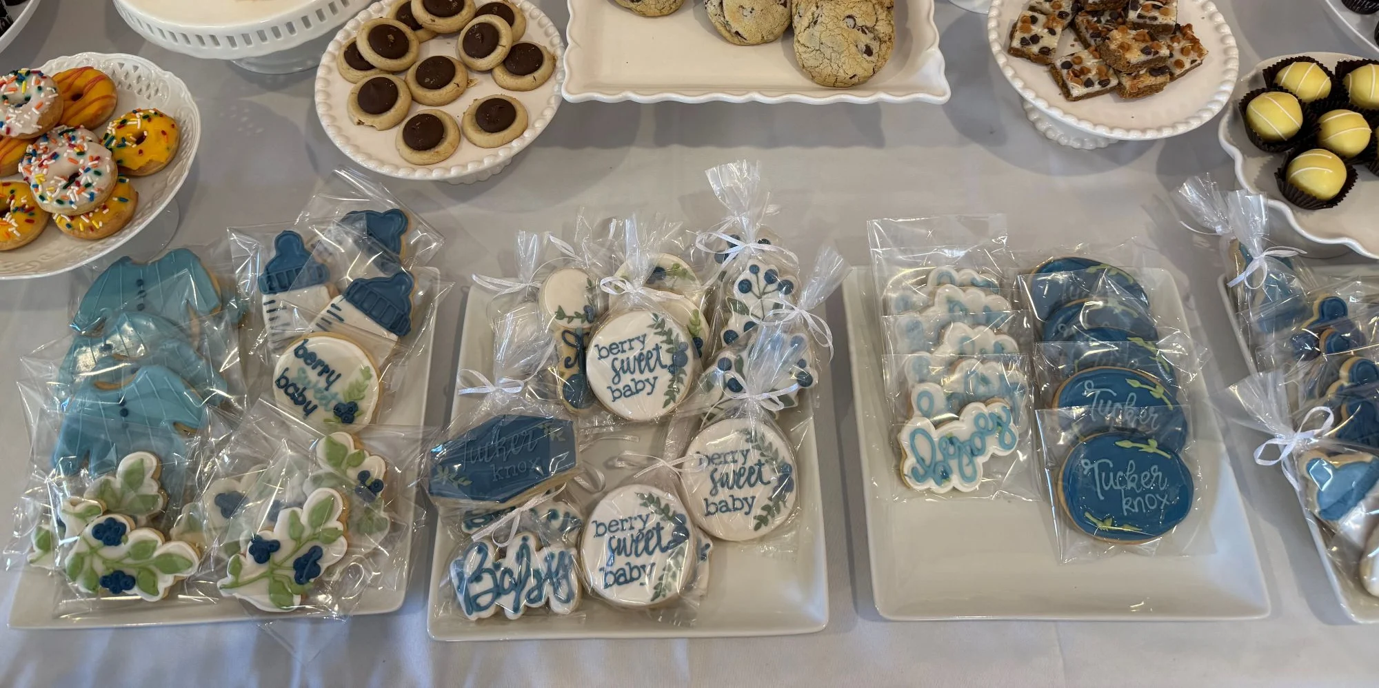 Assorted decorated cookies and desserts for a celebration