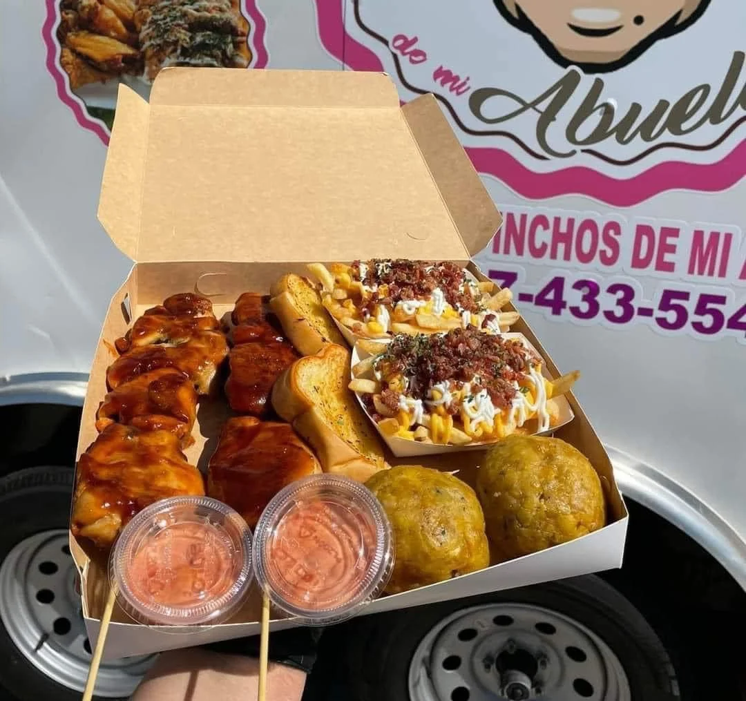 Delicious Mexican street food platter with grilled meats and loaded fries