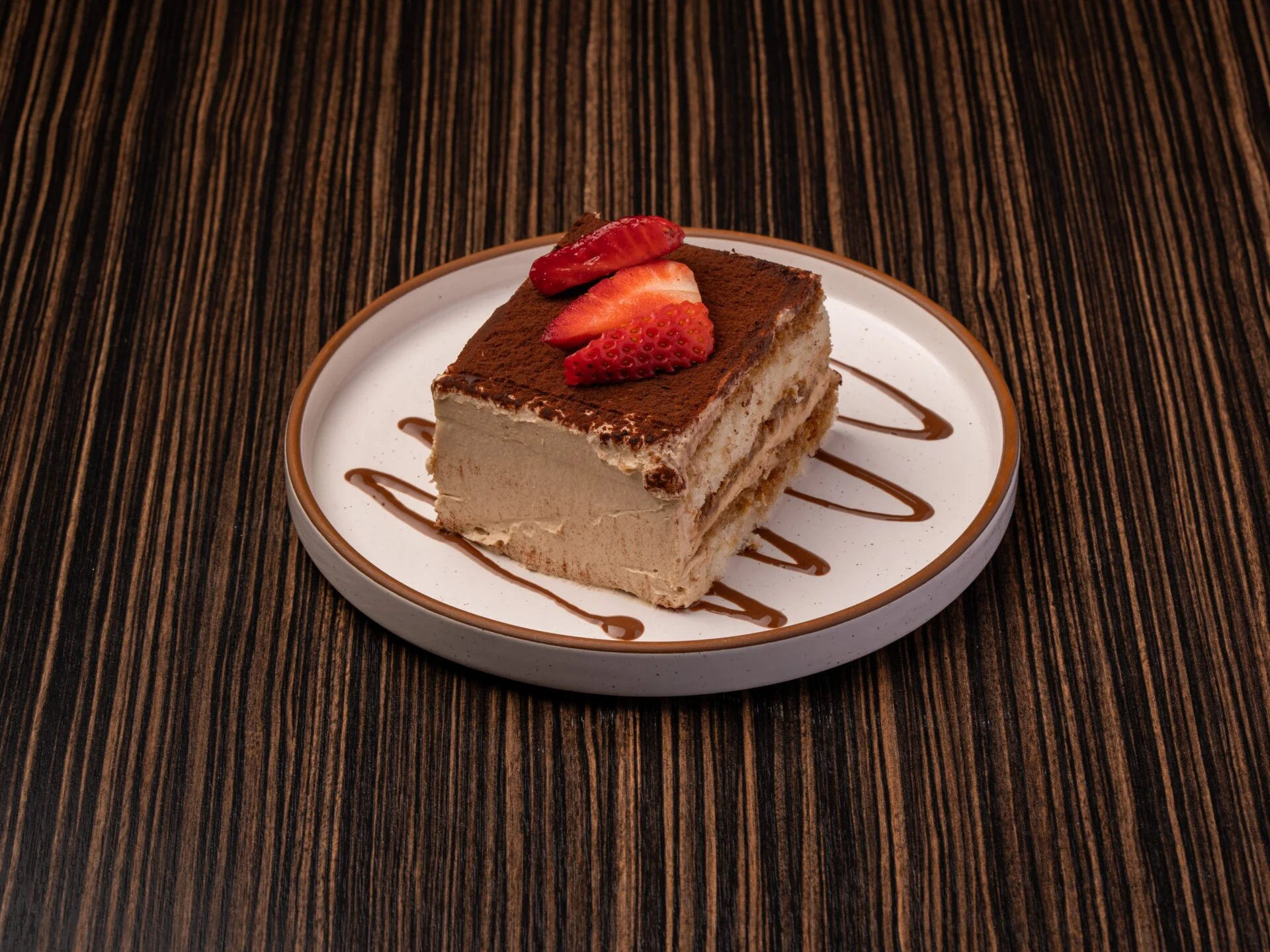Classic Italian tiramisu dessert with strawberries