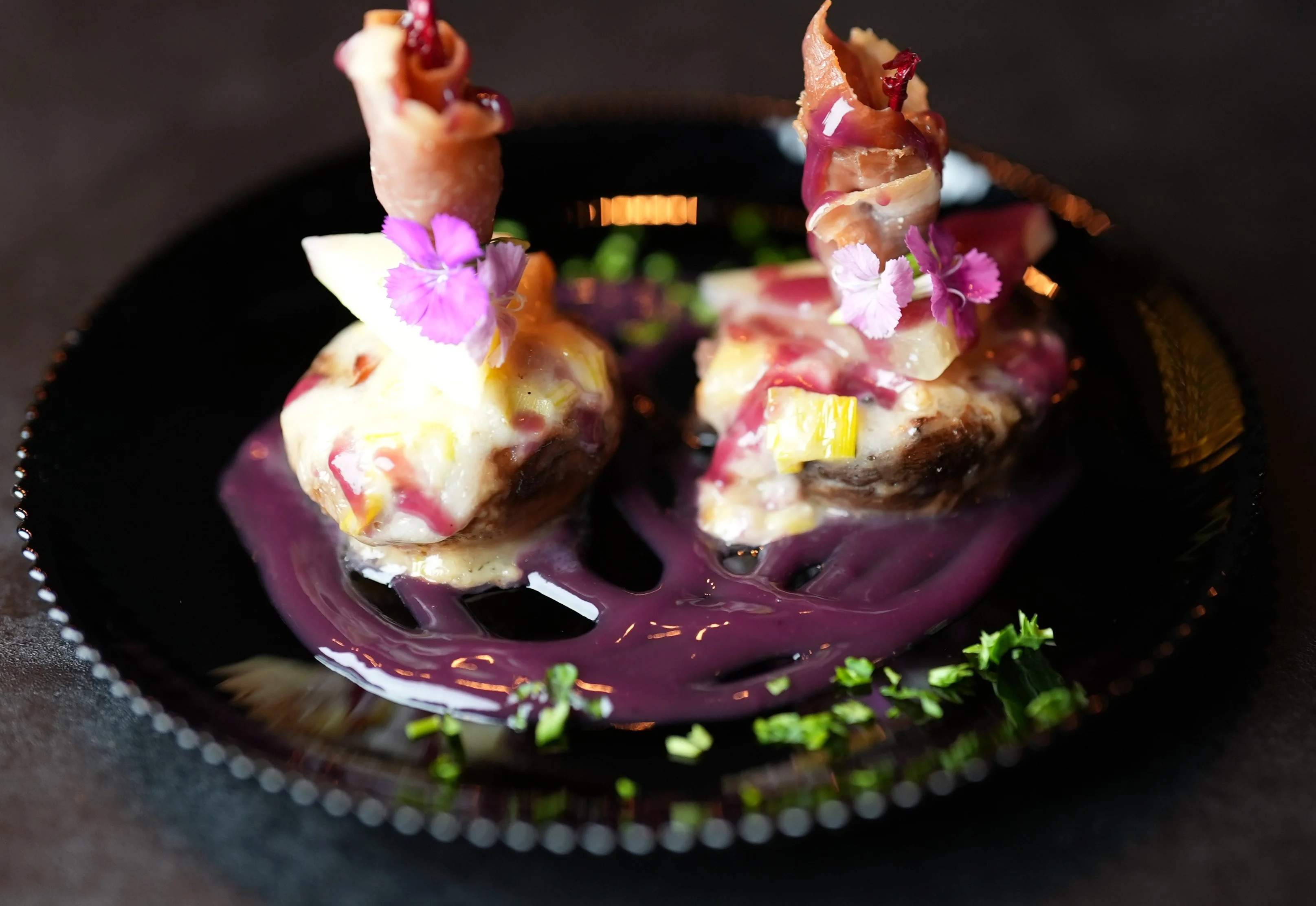Delicious stuffed mushrooms topped with herbs and spices.