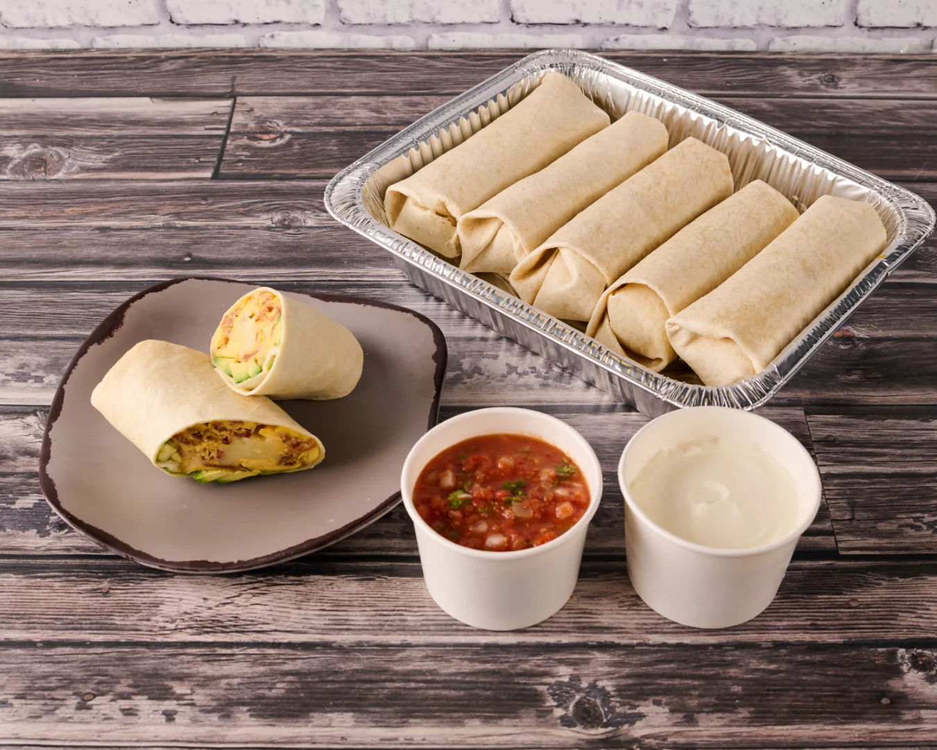 A beautifully arranged catering spread with various dishes and garnishes.