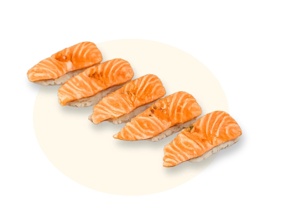 Japanese salmon nigiri sushi on a white plate