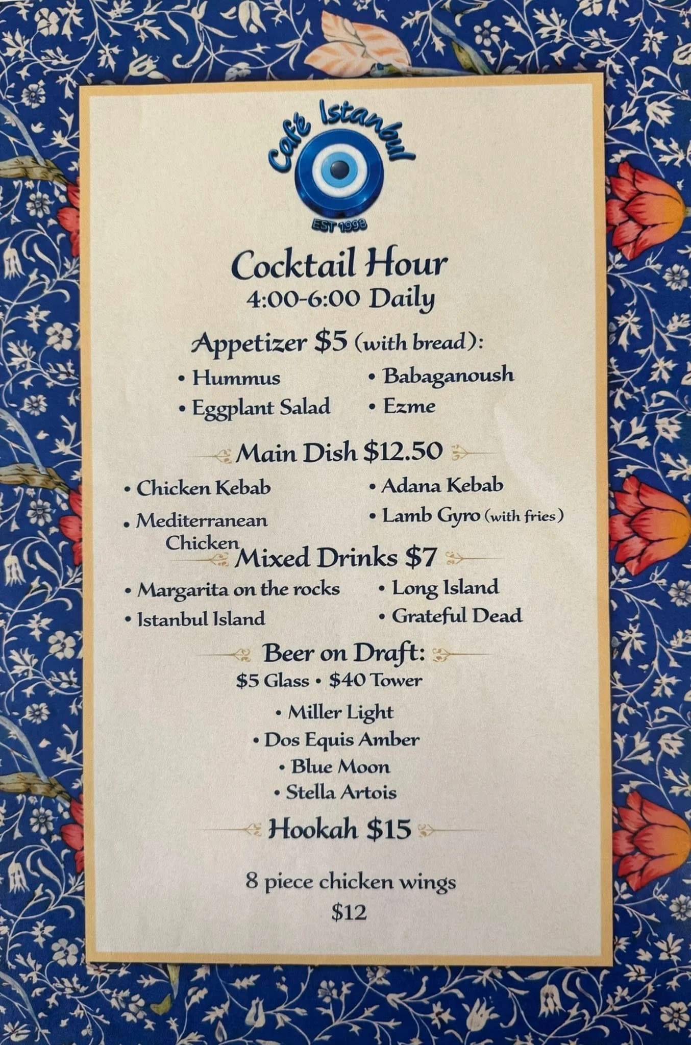 A menu from a café listing appetizers, main dishes, and drinks during cocktail hour.