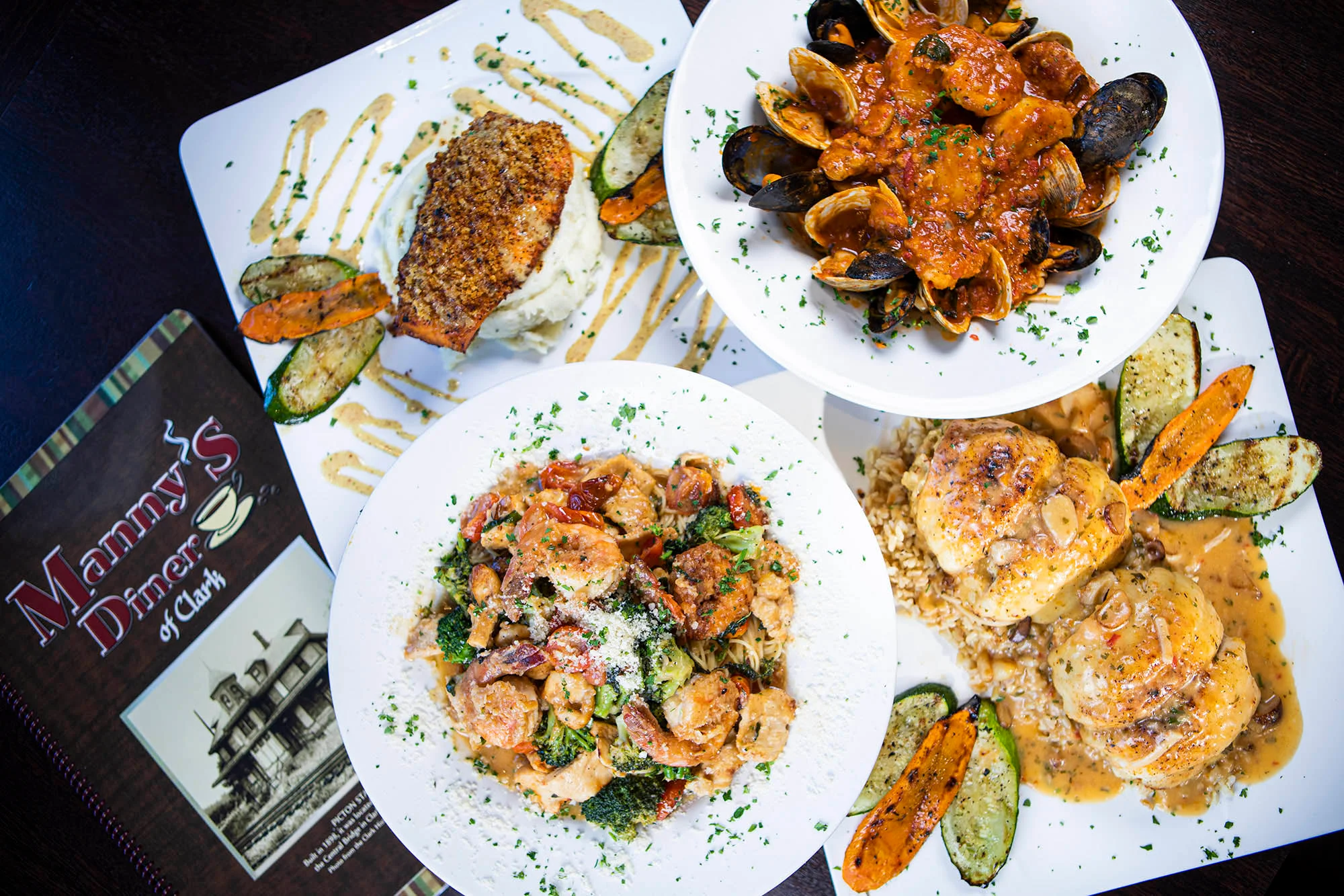 Seafood pasta dish with shrimp and clams in a rich sauce