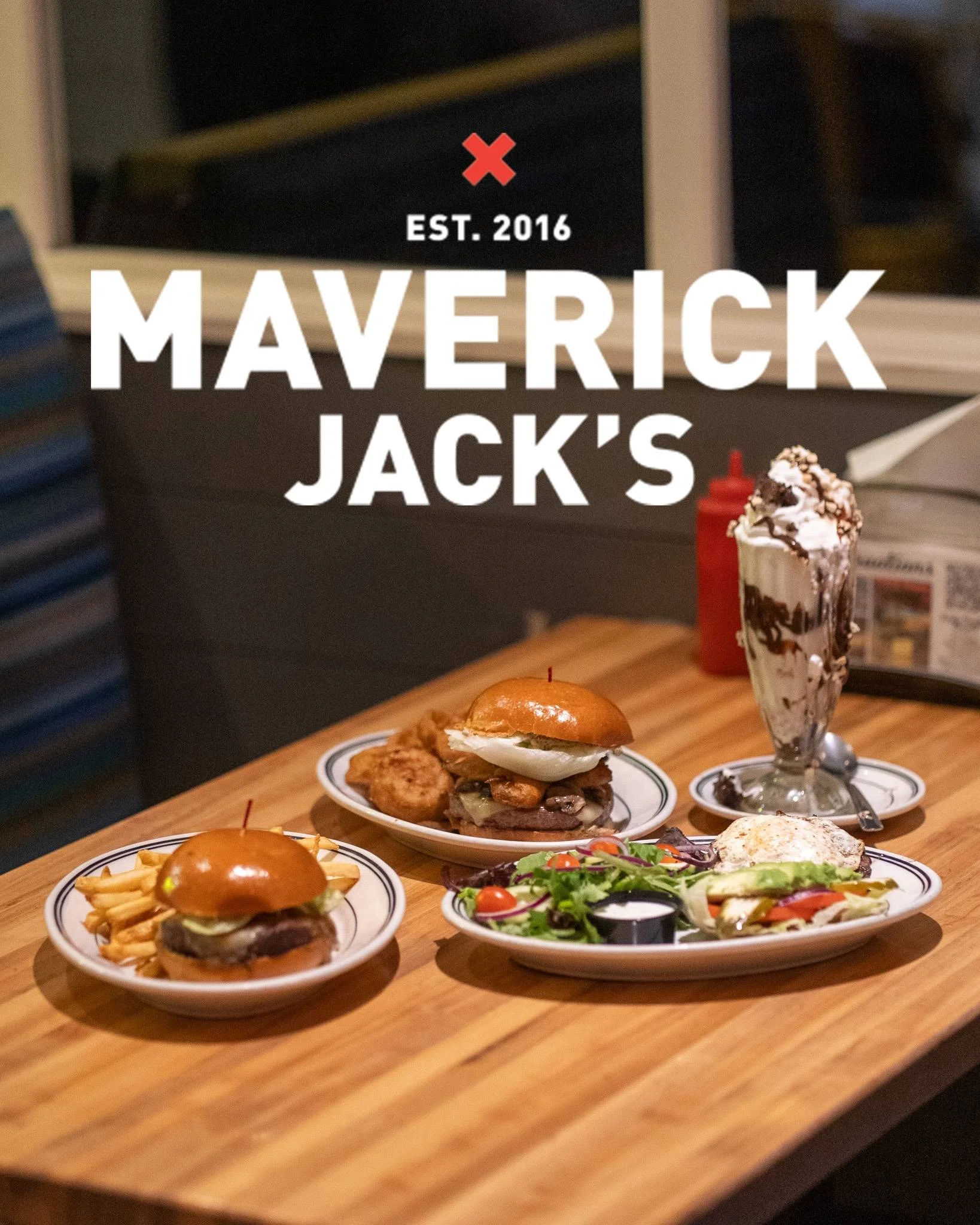 A logo featuring the name 'Maverick Jack's' with the tagline 'Mostly Burgers' and mentions of drinks and other food.
