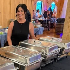 Delicious gourmet burger with fresh toppings on a wooden table