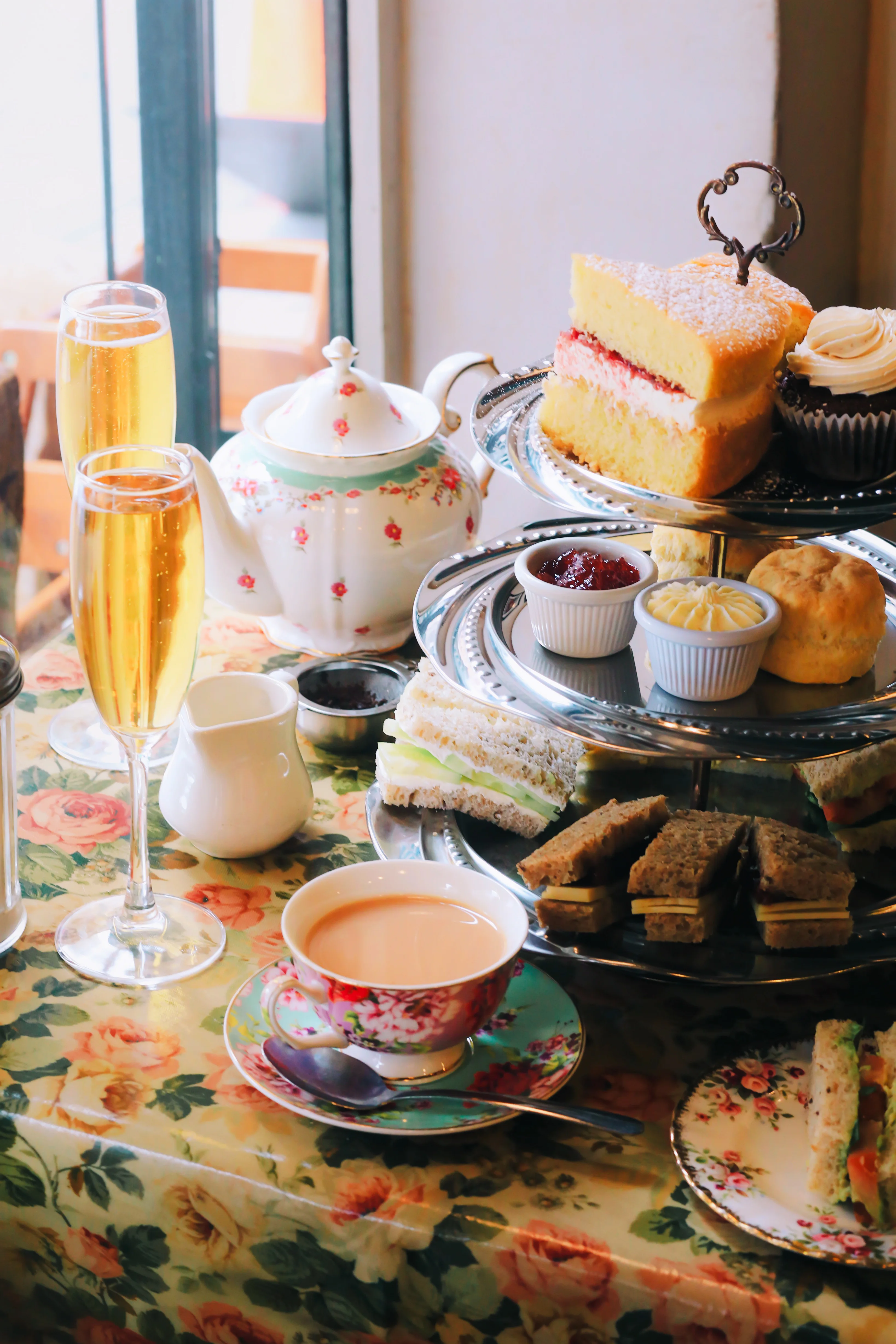 Traditional English afternoon tea with scones and pastries