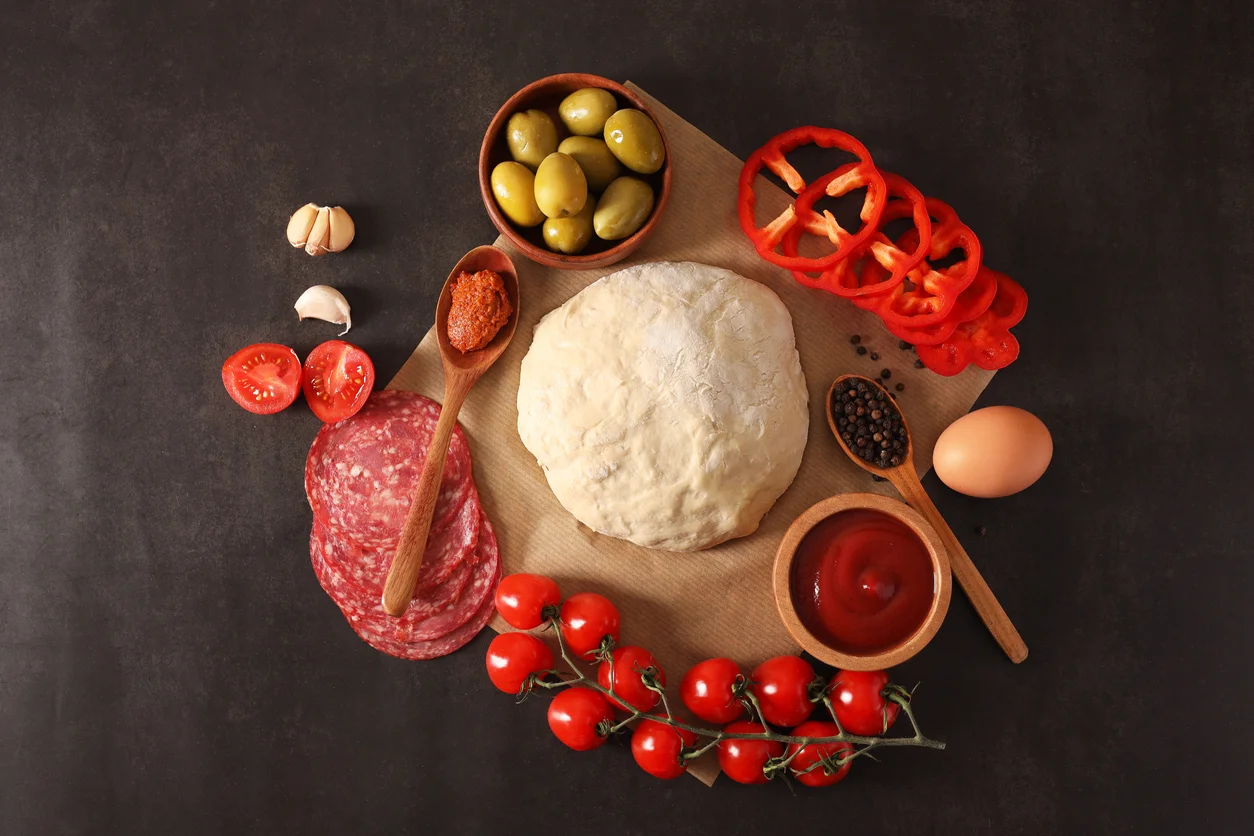 Ingredients for homemade Italian pizza preparation
