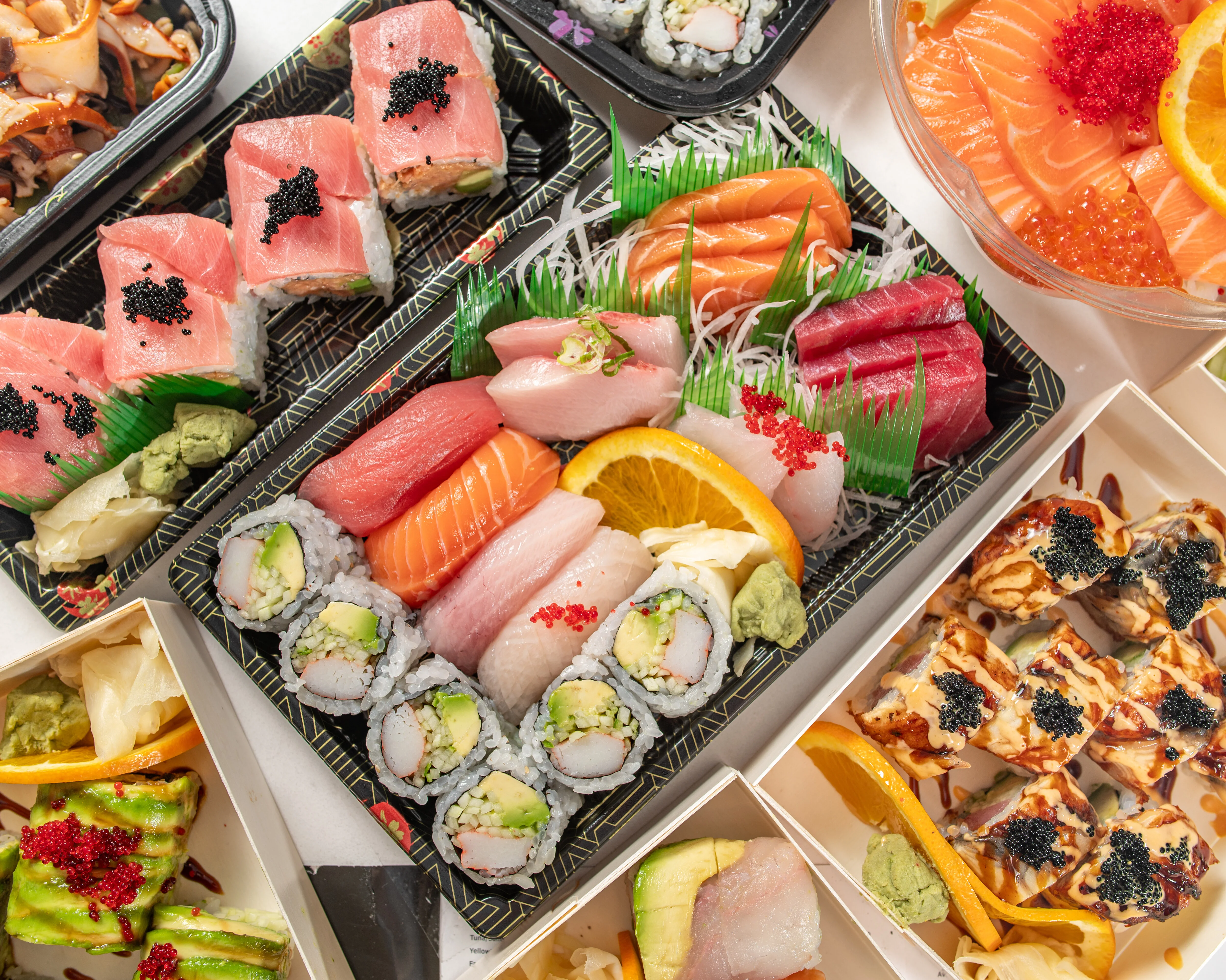 Assorted Japanese sushi platter with fresh sashimi and rolls