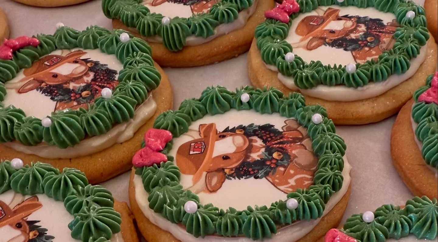 Decorative holiday cookies with festive designs and green frosting
